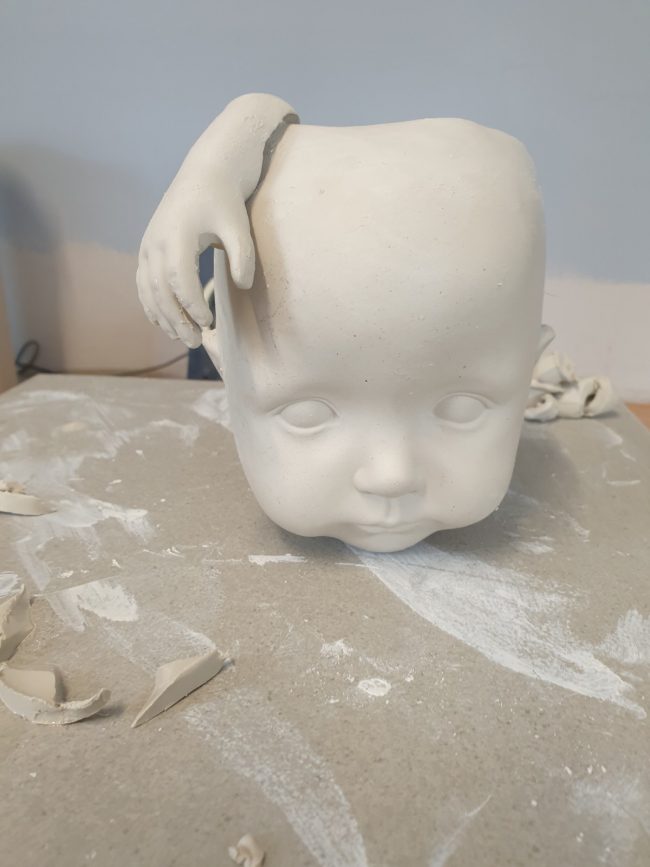 baby planter with hand